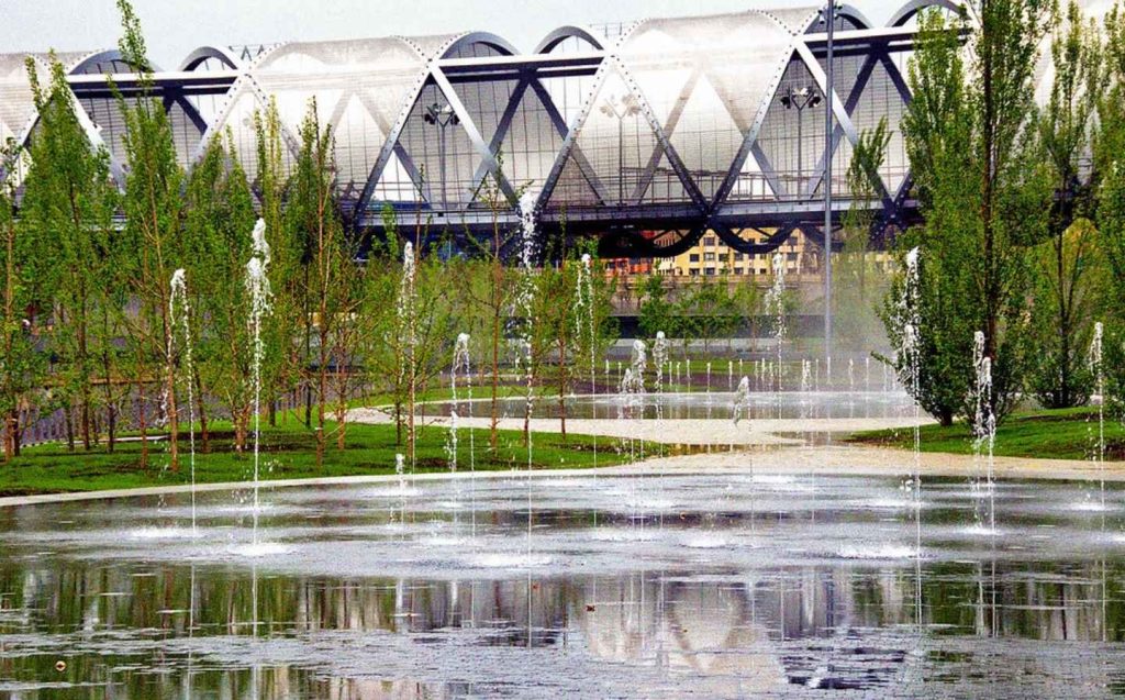Large building with a bridge over it, ideal for enjoying the sunrise from the best viewpoints.